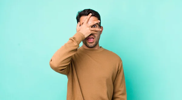 Young Handsome Hicpanic Man Looking Shocked Scared Terrified Covering Face — Fotografia de Stock