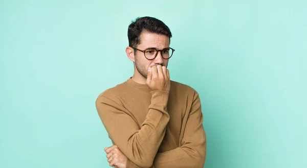 Young Handsome Hicpanic Man Feeling Serious Thoughtful Concerned Staring Sideways — Photo