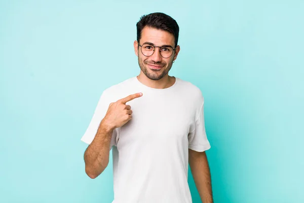 Young Handsome Hicpanic Man Looking Proud Confident Happy Smiling Pointing — стоковое фото