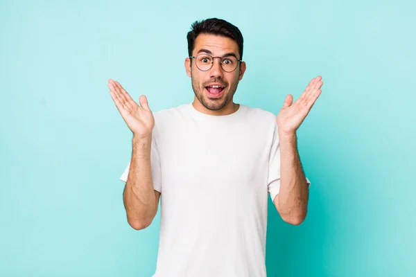 Young Handsome Hicpanic Man Looking Happy Excited Shocked Unexpected Surprise — Fotografia de Stock