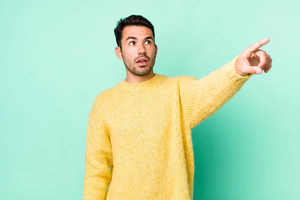 Young Handsome Hicpanic Man Feeling Shocked Surprised Pointing Looking Upwards — Fotografia de Stock