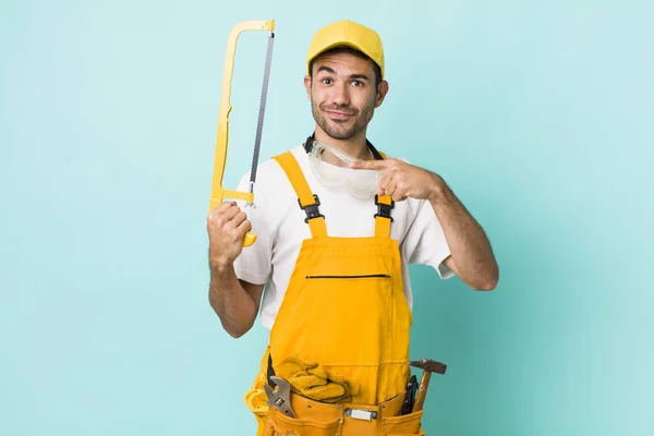 Young Adult Man Handyman Saw Concept — Zdjęcie stockowe