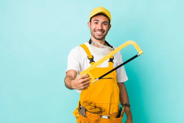 Young Adult Man Handyman Saw Concept — Zdjęcie stockowe