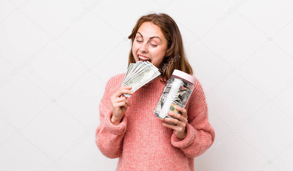 young pretty woman with banknotes. savings concept