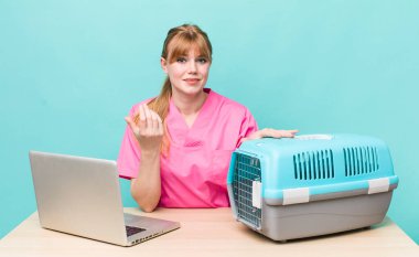 Kızıl saçlı güzel kadın. Veterinerlik kavramı