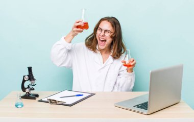young physician woman with a microscophe. sciencist concept