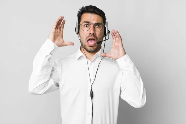 Young Adult Hispanic Man Screaming Hands Air Telemarketer Concept — Stock Photo, Image