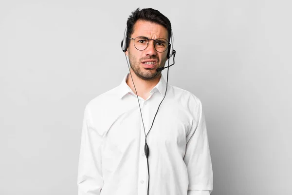 Young Adult Hispanic Man Feeling Puzzled Confused Telemarketer Concept — Stock Photo, Image