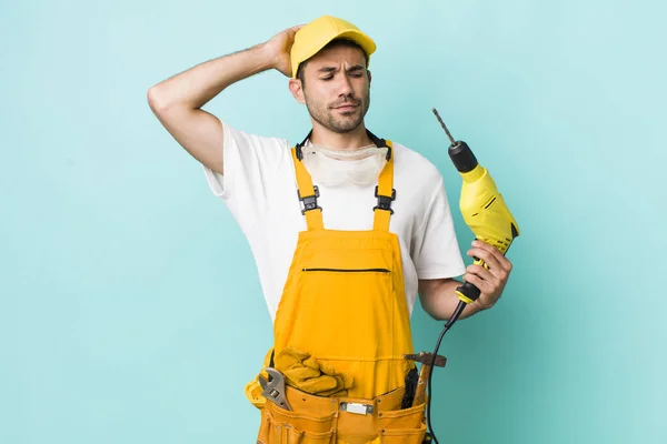 Young Adult Hispanic Man Smiling Happily Daydreaming Doubting Worker Drill — Foto de Stock