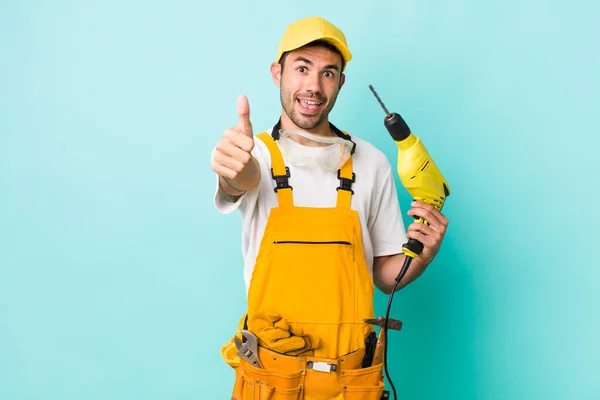 Young Adult Hispanic Man Feeling Proud Smiling Positively Thumbs Worker — Stock Photo, Image