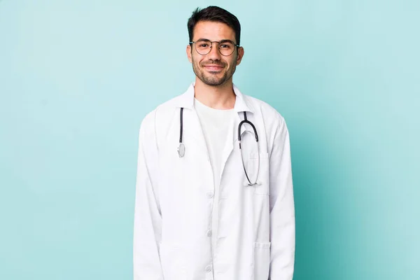Young Adult Hispanic Man Smiling Happily Hand Hip Confident Physician — 스톡 사진