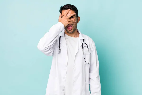 Young Adult Hispanic Man Looking Shocked Scared Terrified Covering Face — Foto de Stock