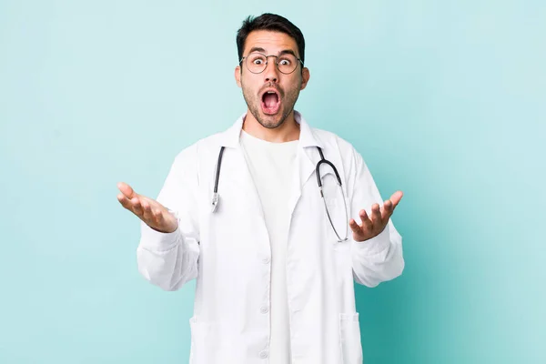 Young Adult Hispanic Man Amazed Shocked Astonished Unbelievable Surprise Physician — 스톡 사진