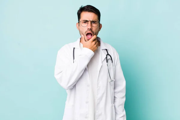 Young Adult Hispanic Man Mouth Eyes Wide Open Hand Chin — Stock Photo, Image