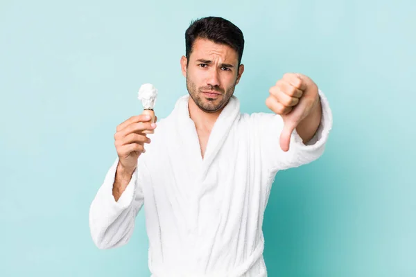 Young Adult Hispanic Man Feeling Cross Showing Thumbs Shaving Concept — ストック写真