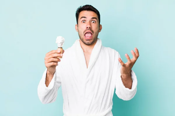 Young Adult Hispanic Man Looking Desperate Frustrated Stressed Shaving Concept — Stok fotoğraf