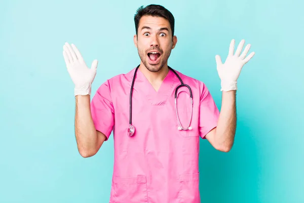 Young Adult Hispanic Man Feeling Happy Astonished Something Unbelievable Veterinarian — 스톡 사진