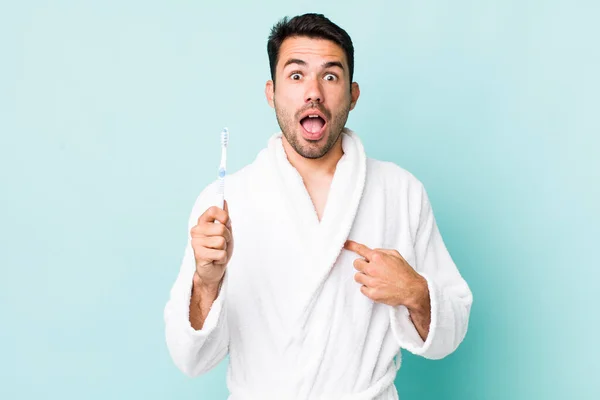 Young Adult Hispanic Man Looking Shocked Surprised Mouth Wide Open — ストック写真
