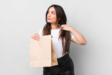 young pretty woman feeling stressed, anxious, tired and frustrated. take away food concept