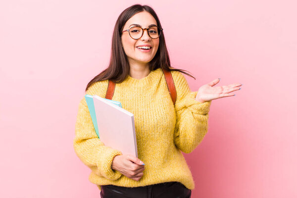 young pretty woman feeling happy, surprised realizing a solution or idea. university student concept