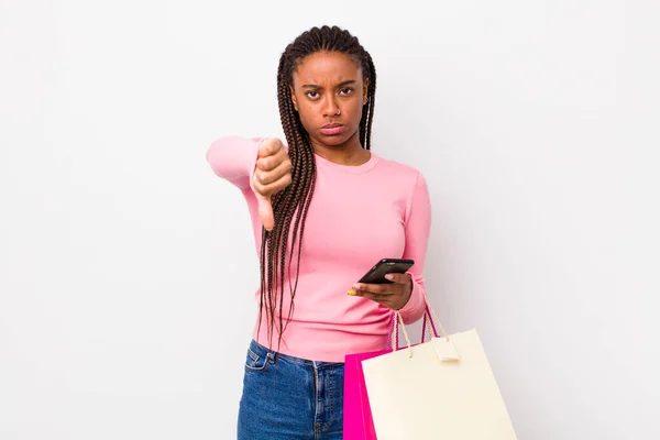 Young Adult Black Woman Feeling Cross Showing Thumbs Shopping Bags — Stockfoto