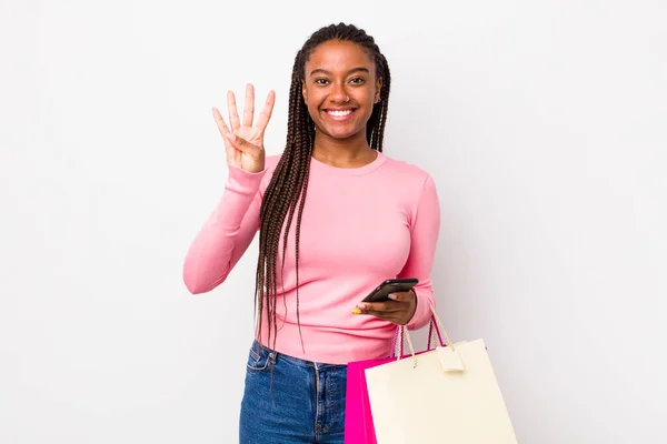 Young Adult Black Woman Smiling Looking Friendly Showing Number Four — Stockfoto