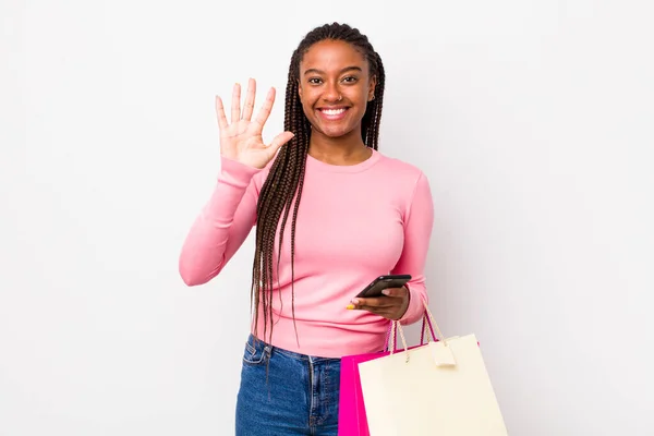 Young Adult Black Woman Smiling Looking Friendly Showing Number Five — Stockfoto