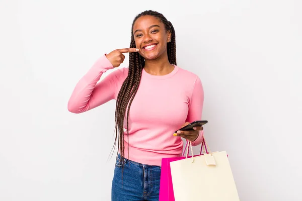 Young Adult Black Woman Smiling Confidently Pointing Own Broad Smile —  Fotos de Stock