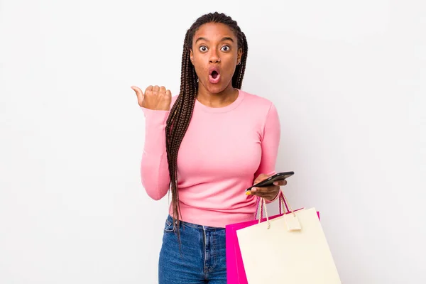 Young Adult Black Woman Looking Astonished Disbelief Shopping Bags Concept — Stockfoto