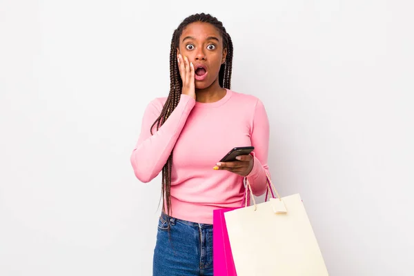 Young Adult Black Woman Feeling Shocked Scared Shopping Bags Concept — Stockfoto