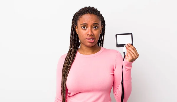Young Adult Black Woman Looking Puzzled Confused Vip Pass Concept — Zdjęcie stockowe