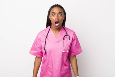 young adult black woman looking very shocked or surprised. veterinarian concept