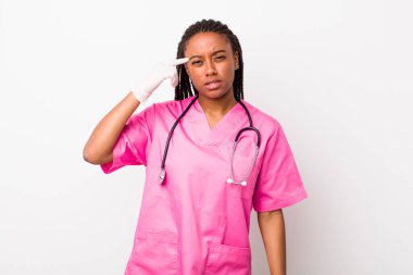 young adult black woman feeling confused and puzzled, showing you are insane. veterinarian concept