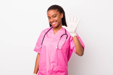 young adult black woman smiling and looking friendly, showing number five. veterinarian concept