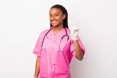 young adult black woman smiling and looking friendly, showing number three. veterinarian concept