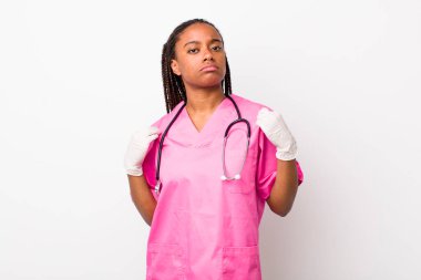 young adult black woman looking arrogant, successful, positive and proud. veterinarian concept