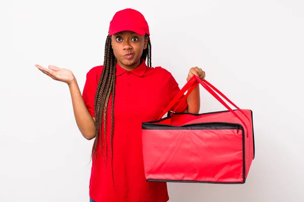 Young Adult Black Woman Feeling Puzzled Confused Doubting Pizza Delivery —  Fotos de Stock