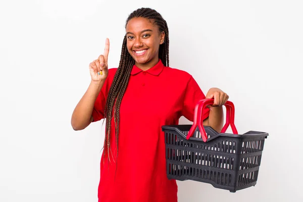Young Adult Black Woman Smiling Looking Friendly Showing Number One — Foto Stock