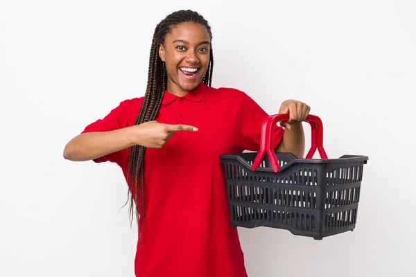 Young Adult Black Woman Looking Excited Surprised Pointing Side Empty —  Fotos de Stock