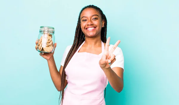 Young Adult Black Woman Smiling Looking Happy Gesturing Victory Peace —  Fotos de Stock
