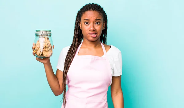 Young Adult Black Woman Looking Puzzled Confused Home Made Cookies —  Fotos de Stock