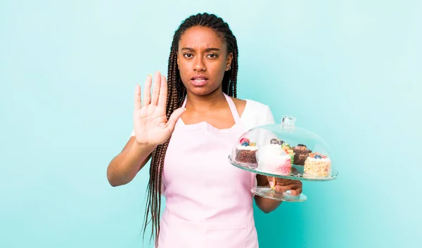 Young Adult Black Woman Looking Serious Showing Open Palm Making — Zdjęcie stockowe