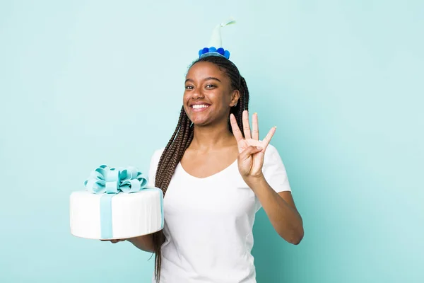 Young Adult Black Woman Smiling Looking Friendly Showing Number Four — Fotografia de Stock