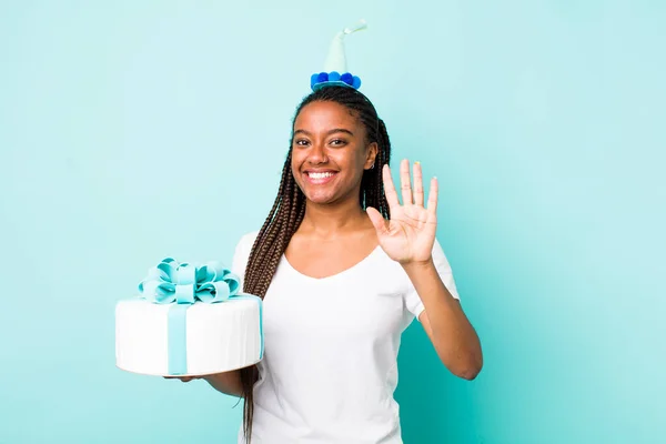 Young Adult Black Woman Smiling Looking Friendly Showing Number Five — Fotografia de Stock