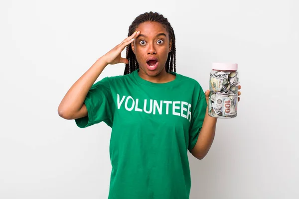 Young Adult Black Woman Looking Happy Astonished Surprised Volunteer Donation — Stok fotoğraf