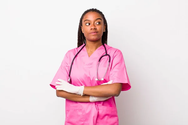 Young Adult Black Woman Shrugging Feeling Confused Uncertain Veterinarian Concept — 스톡 사진