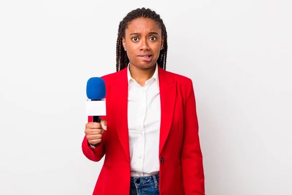 Young Adult Black Woman Looking Puzzled Confused Presenter Microphone Concept — Stockfoto