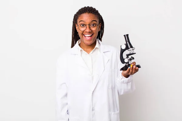 Young Adult Black Woman Looking Happy Pleasantly Surprised Sciencist Microscope — Fotografia de Stock