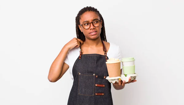 young adult black woman feeling stressed, anxious, tired and frustrated. take away coffees concept