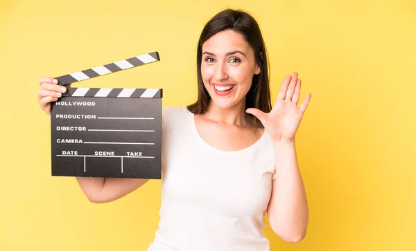 Young Adult Pretty Woman Smiling Happily Waving Hand Welcoming Greeting — Stock Photo, Image